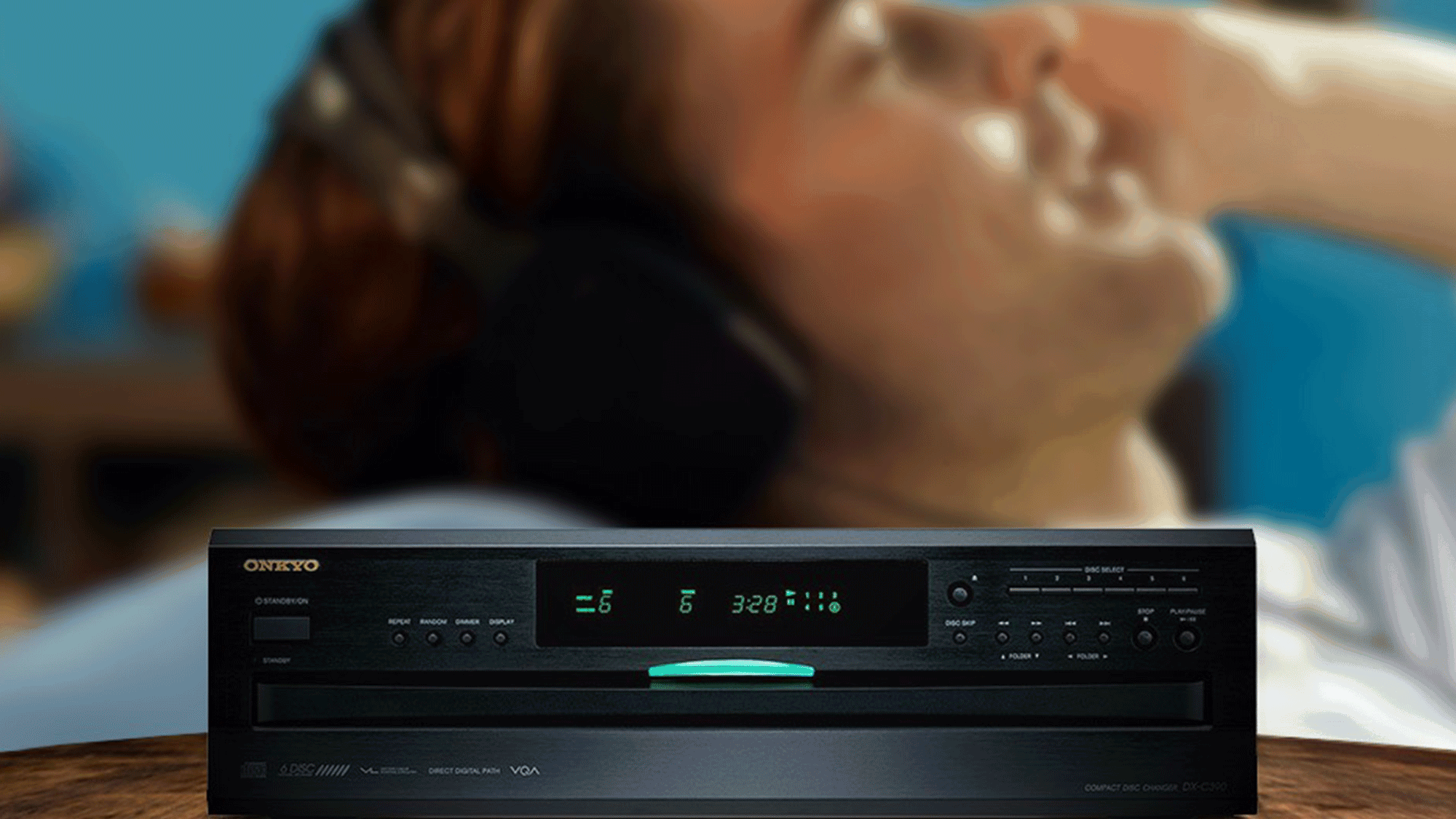 Person Relaxing Listening to Music on Onkyo DXC390 2000x1333